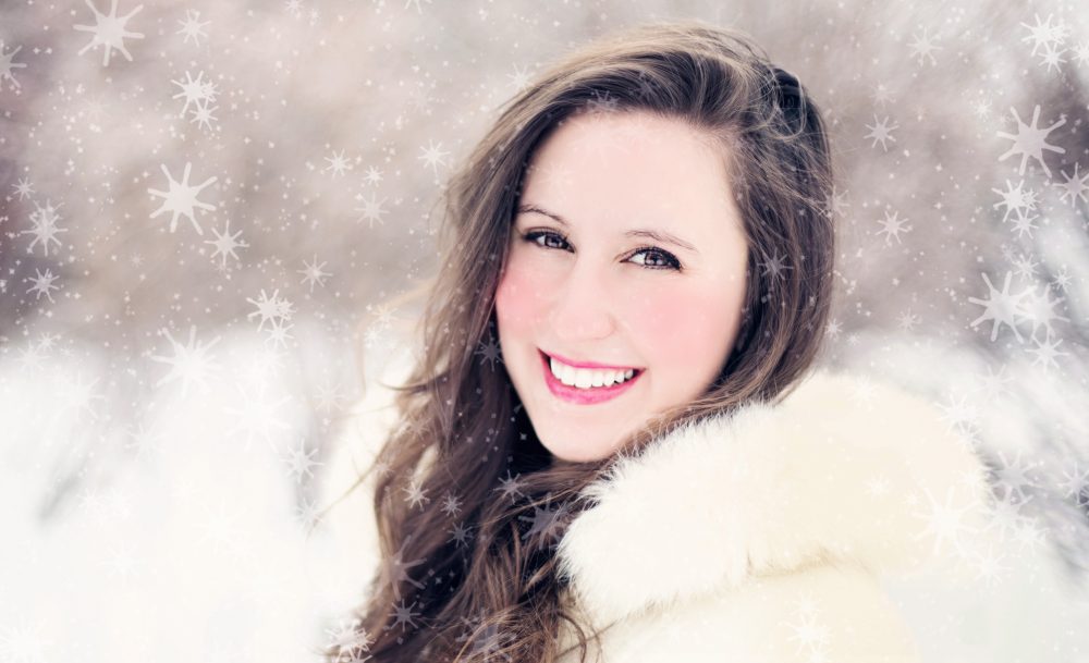 Woman smiling in the snow